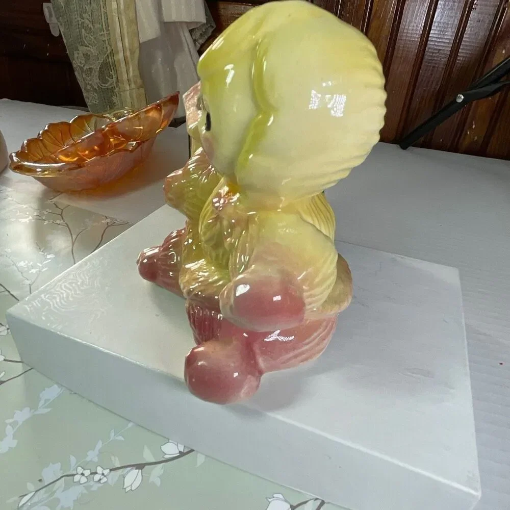 Vintage ceramic American Bisque Yarn Doll planter.